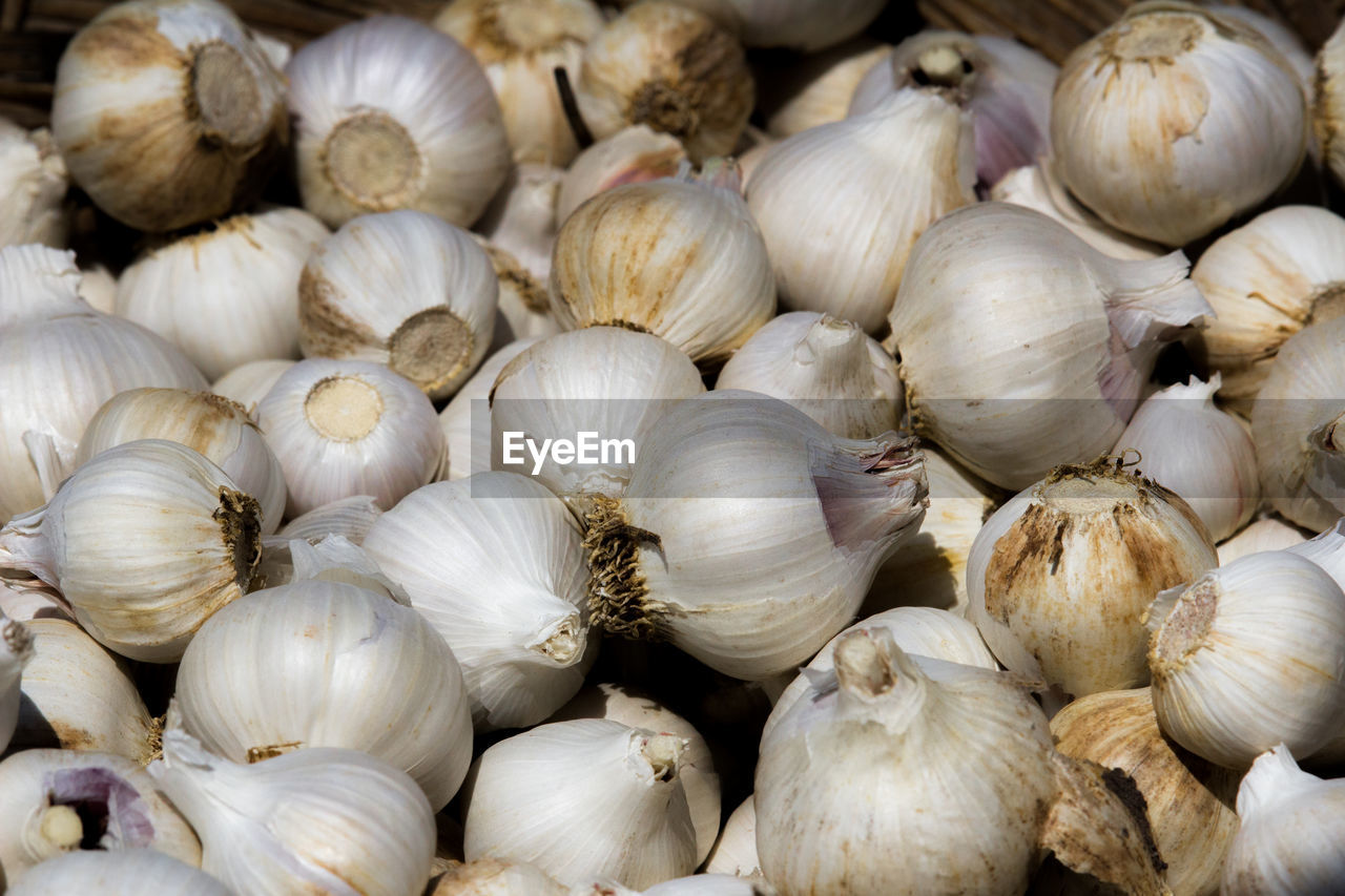 Close-up of onions for sale at market stall