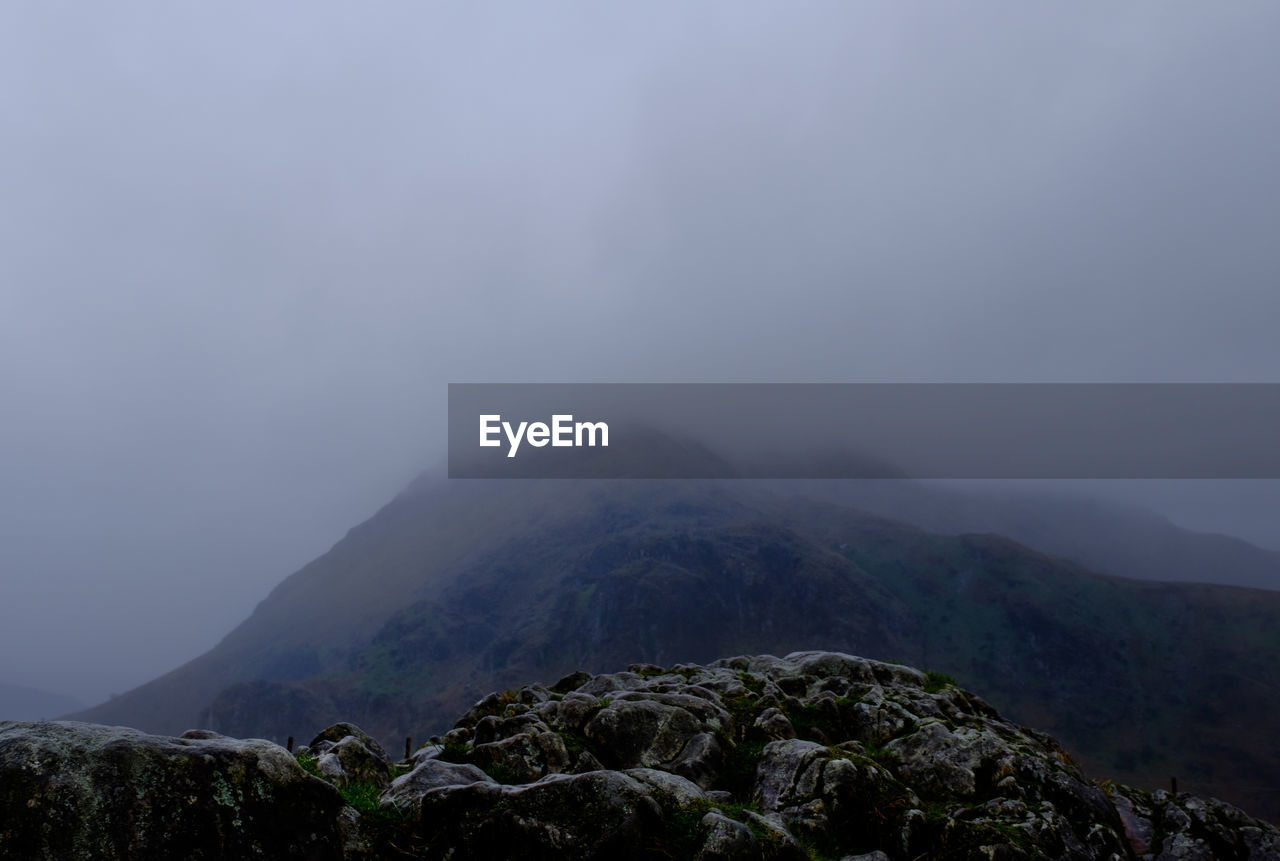 Scenic view of mountains against sky