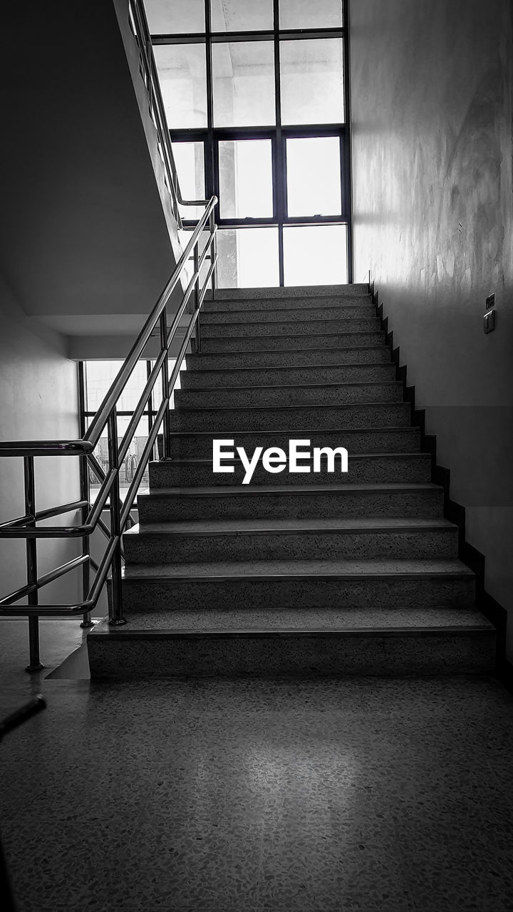 LOW ANGLE VIEW OF EMPTY STEPS IN BUILDING