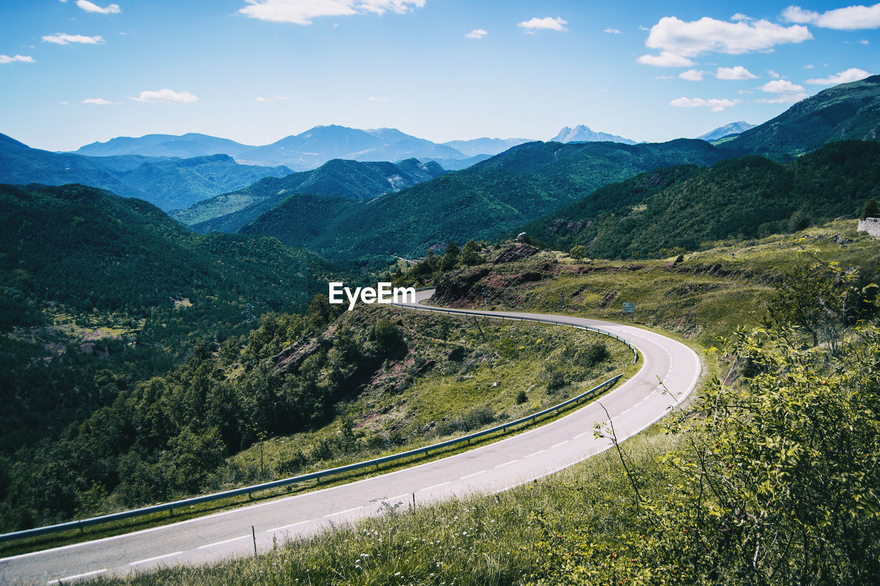 Landscape of the mountains, in spain. a sunny summer day with green trees