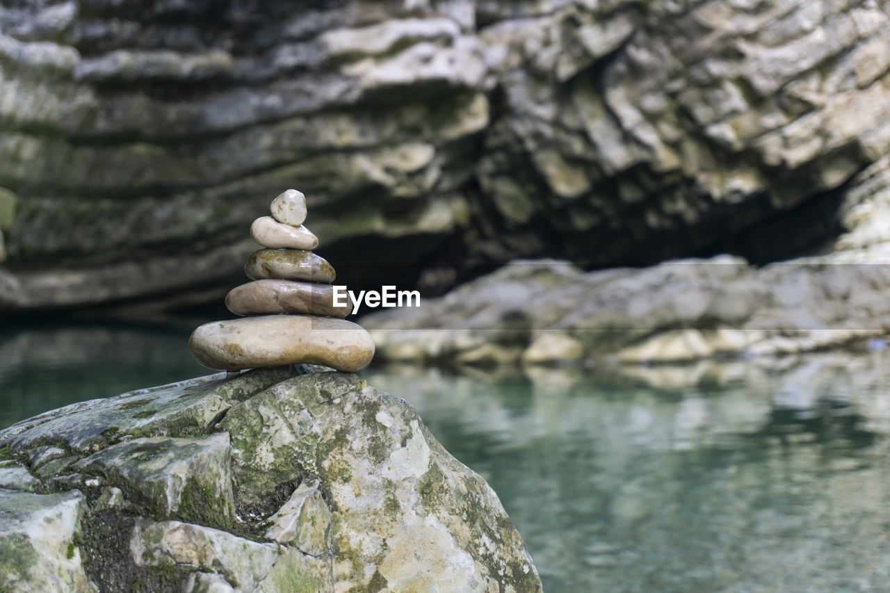 STACK OF STONES ON ROCK