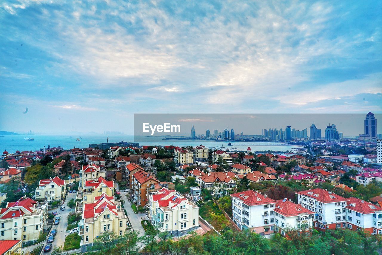 High angle view of buildings against sky