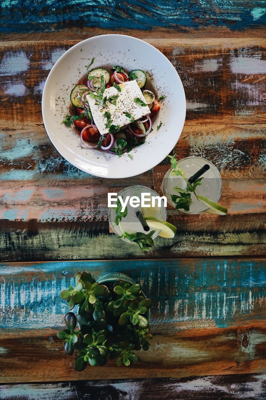 High angle view of chopped vegetables in bowl on table