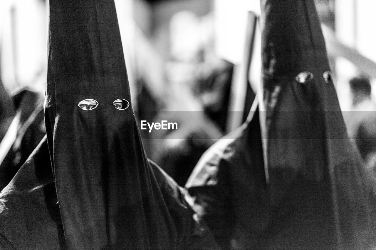 Masked people at holy week processions