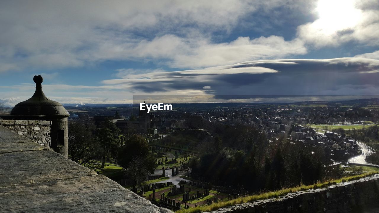 Scenic view of landscape against sky seen from historic building