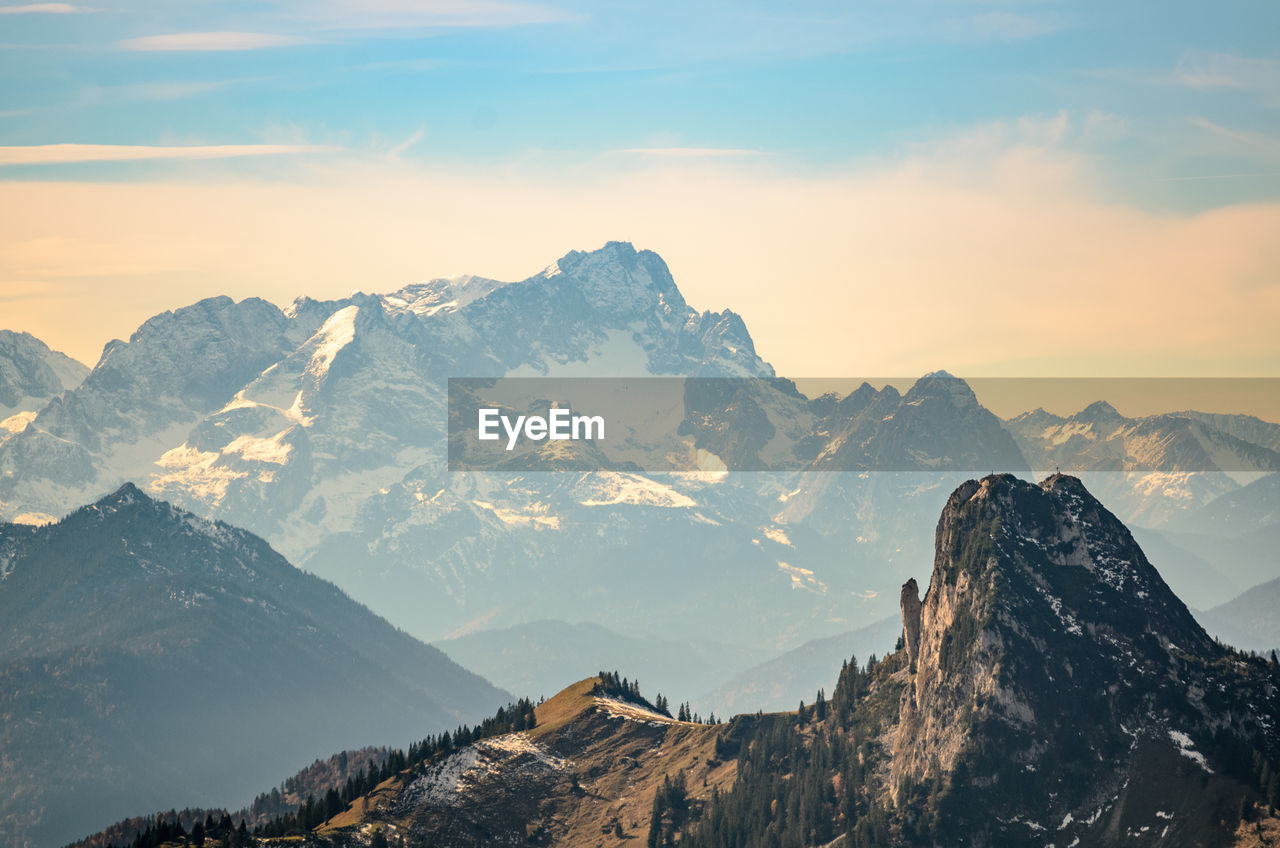 Scenic view of snowcapped mountains against sky