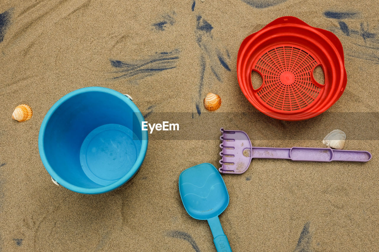 High angle view of objects on sand