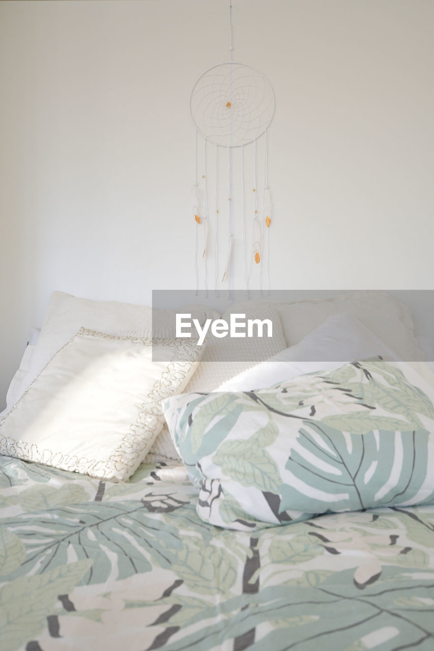 bed, indoors, bedroom, furniture, domestic room, white, no people, bed sheet, textile, home interior, room, duvet cover, pillow, linen, sheet, absence