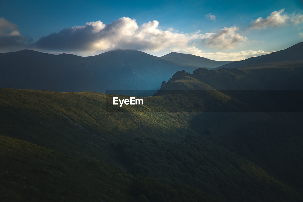 Scenic view of mountains against sky