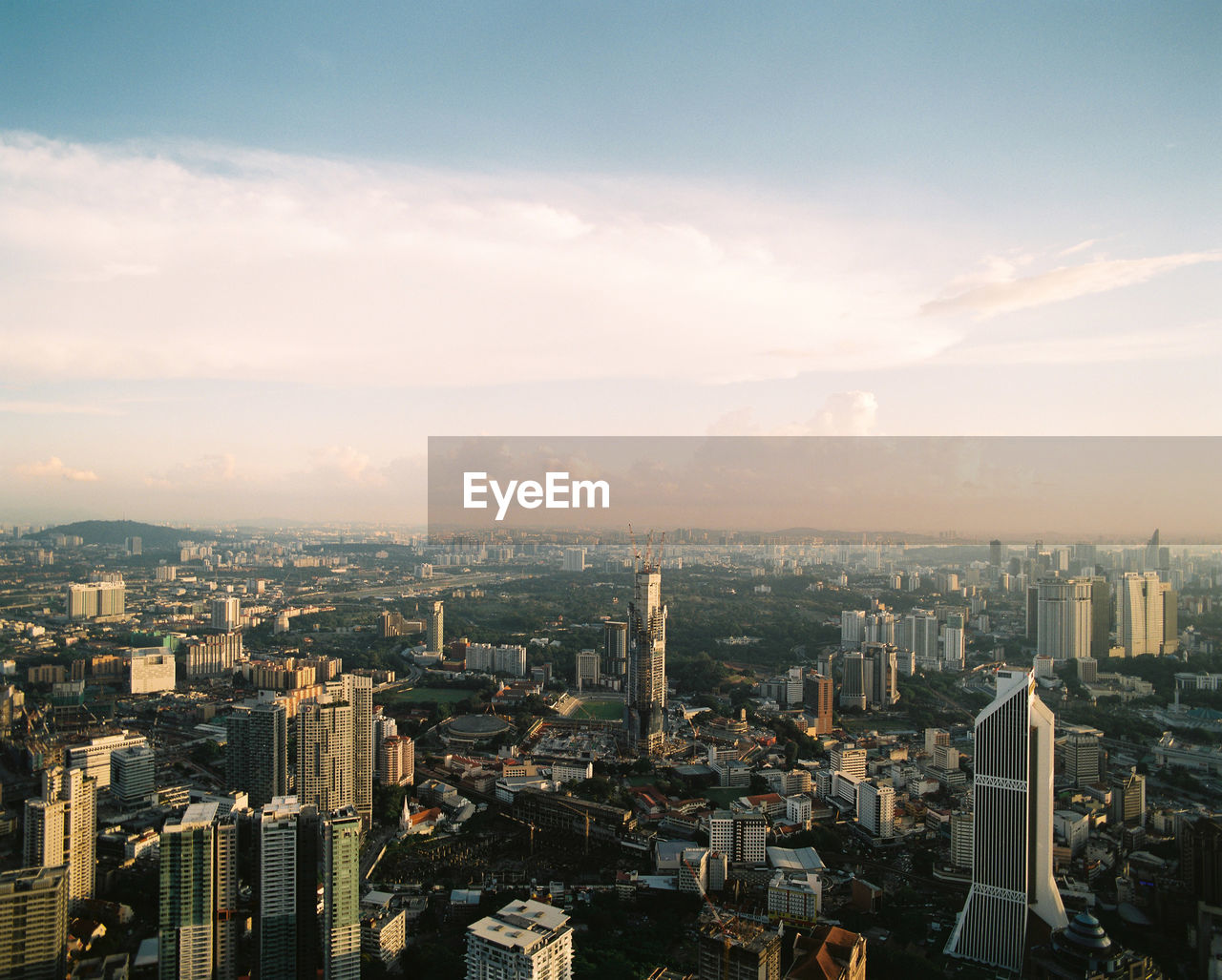 High angle view of buildings against sky in city