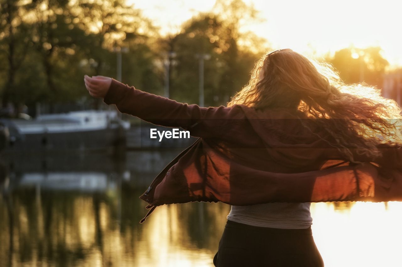 Woman looking at sunset