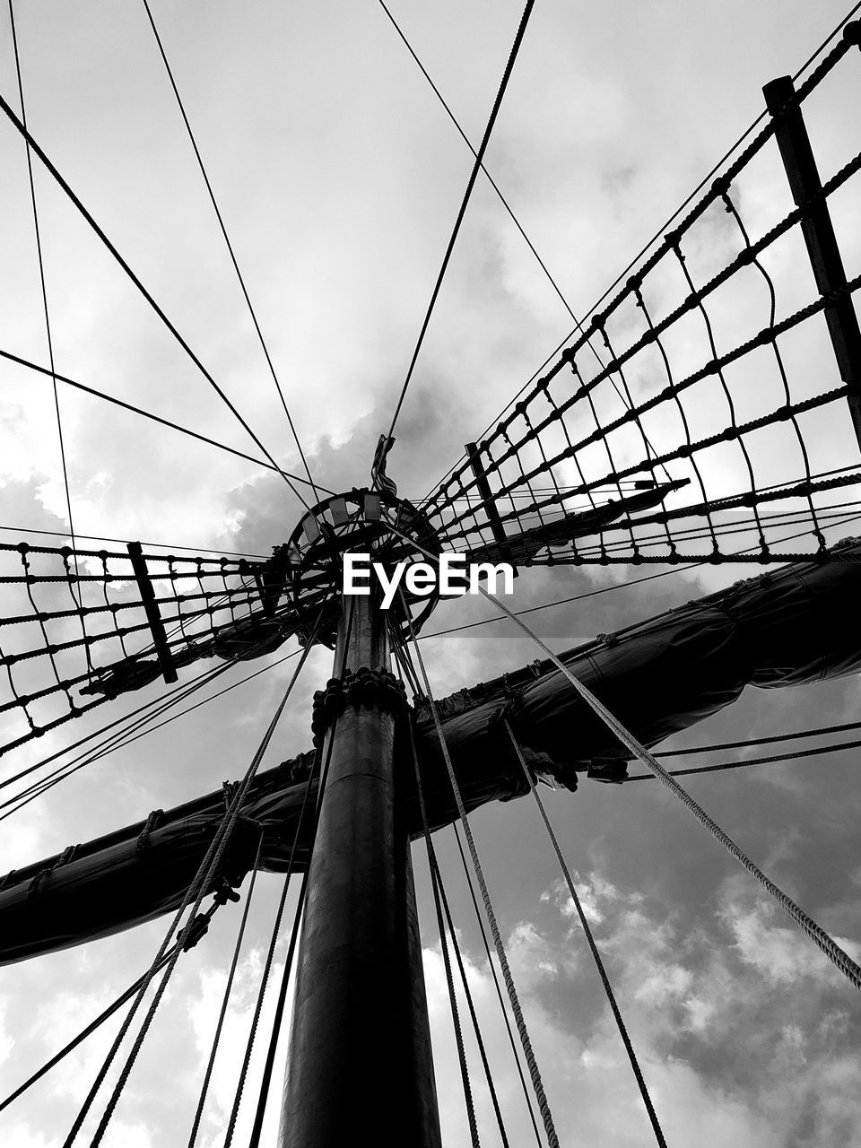 LOW ANGLE VIEW OF MAST AGAINST SKY