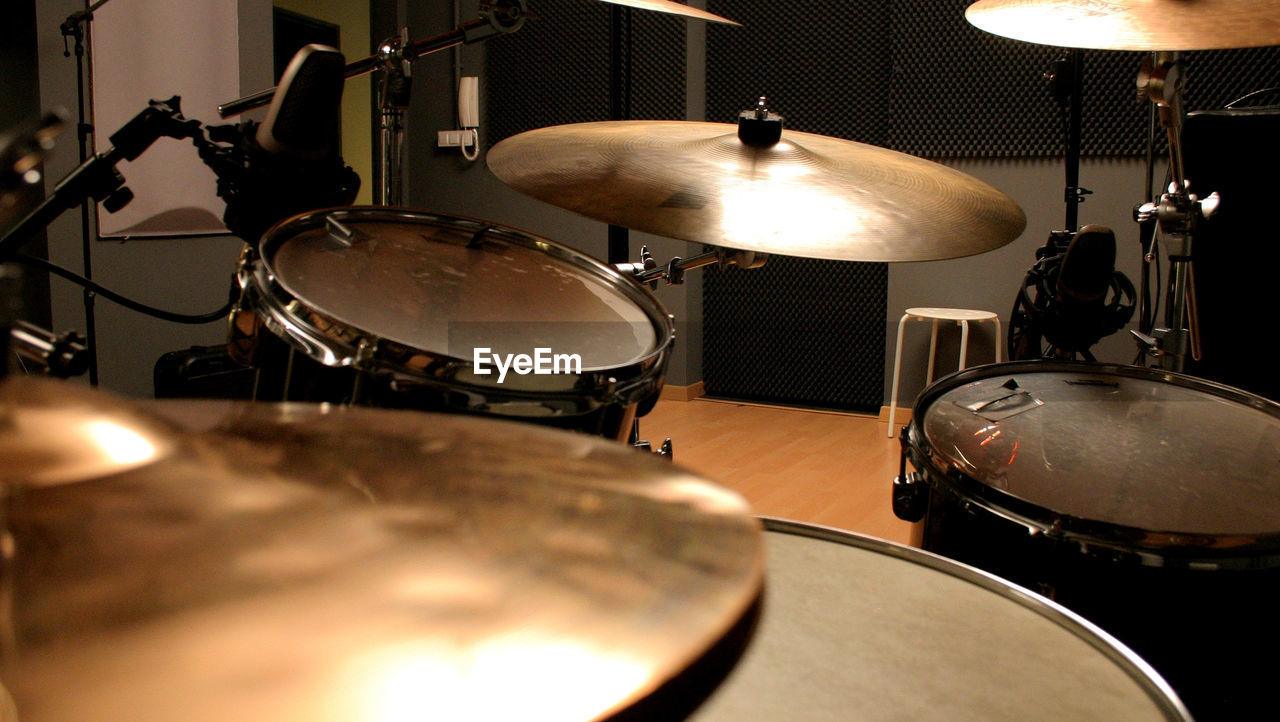 Close-up of drum kit in recording studio