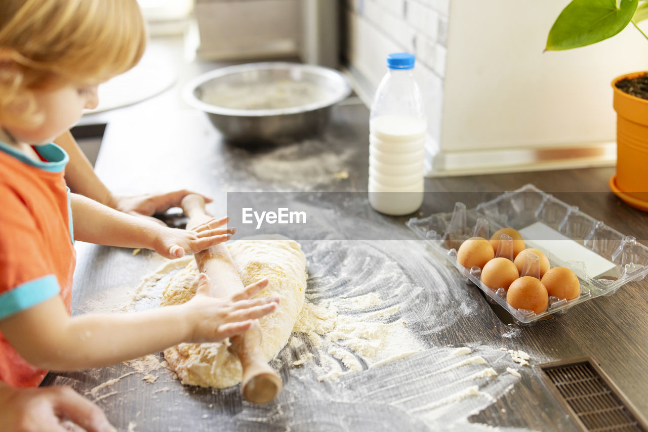 midsection of woman preparing food on table