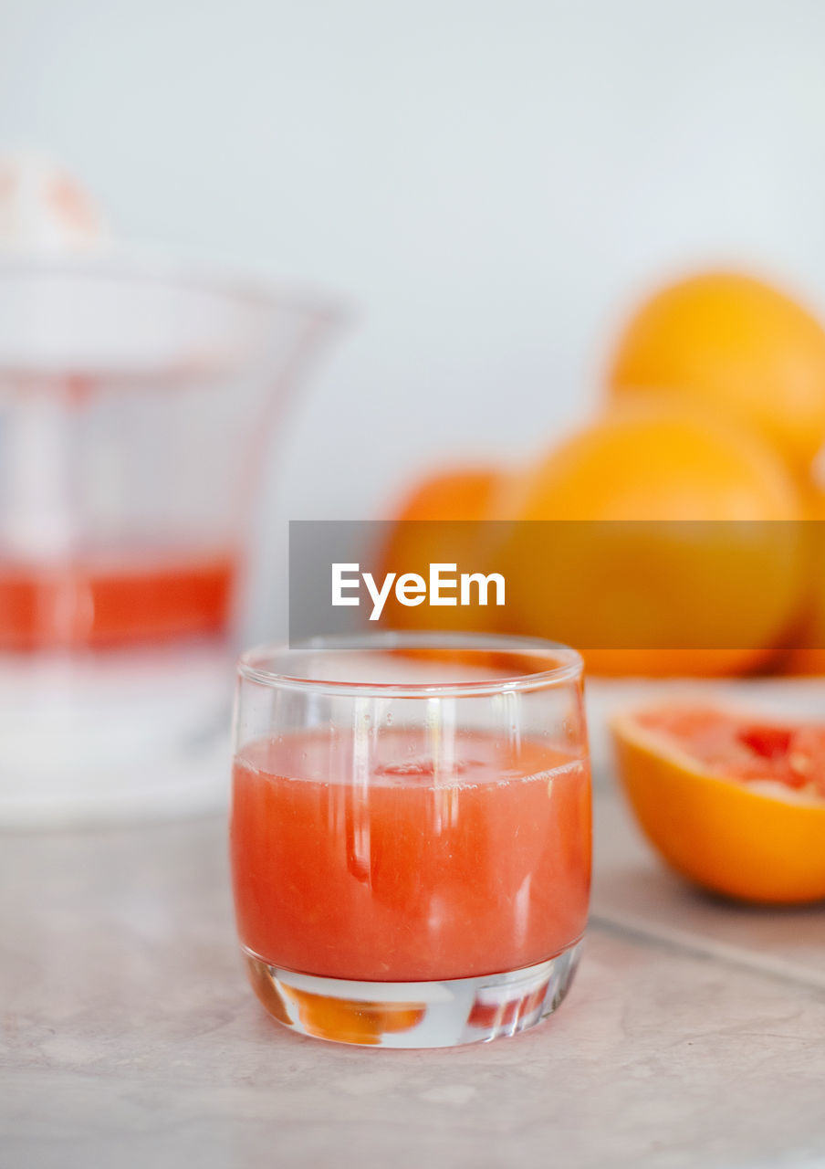 close-up of orange juice on table