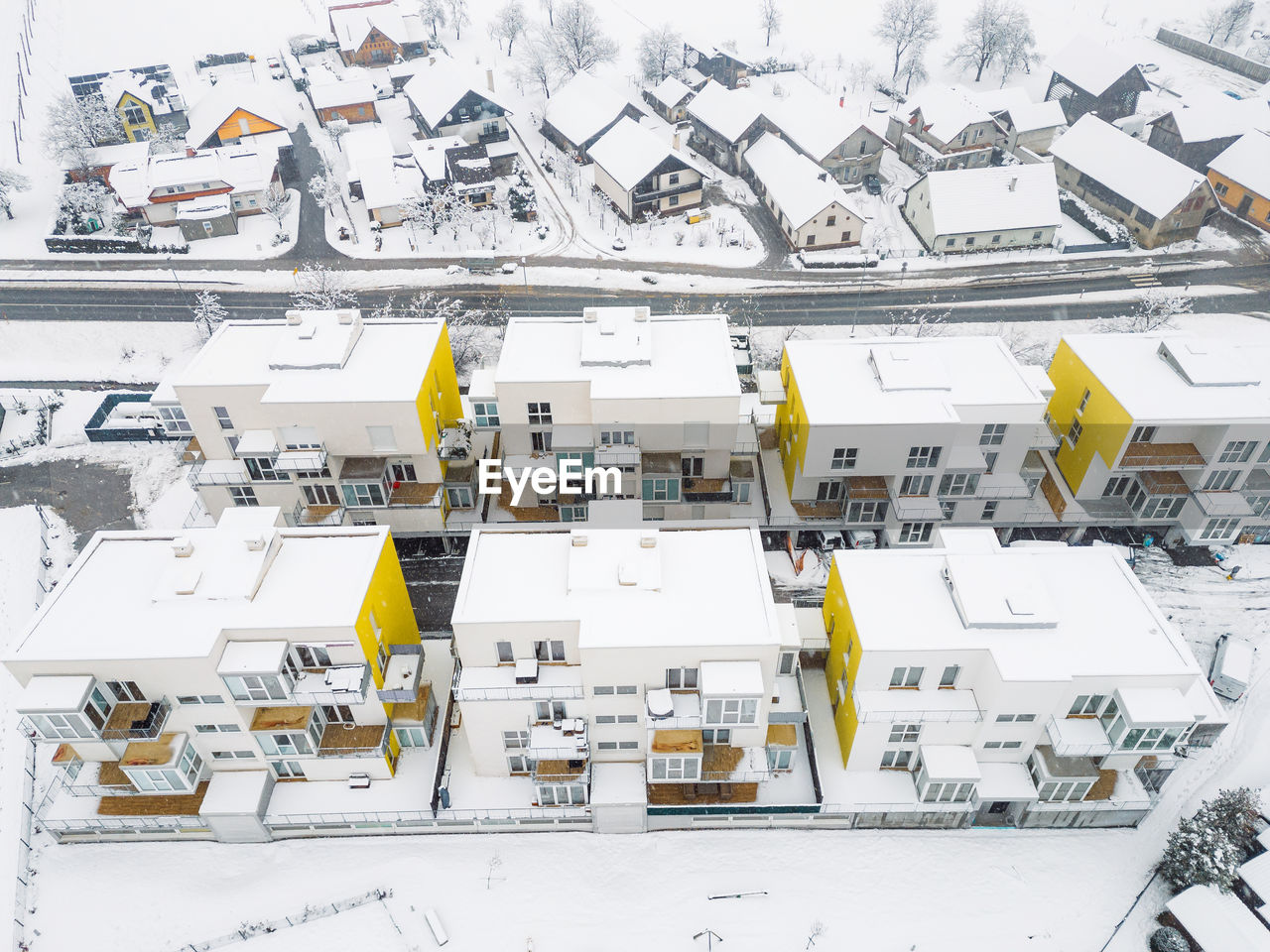 high angle view of people walking on snow