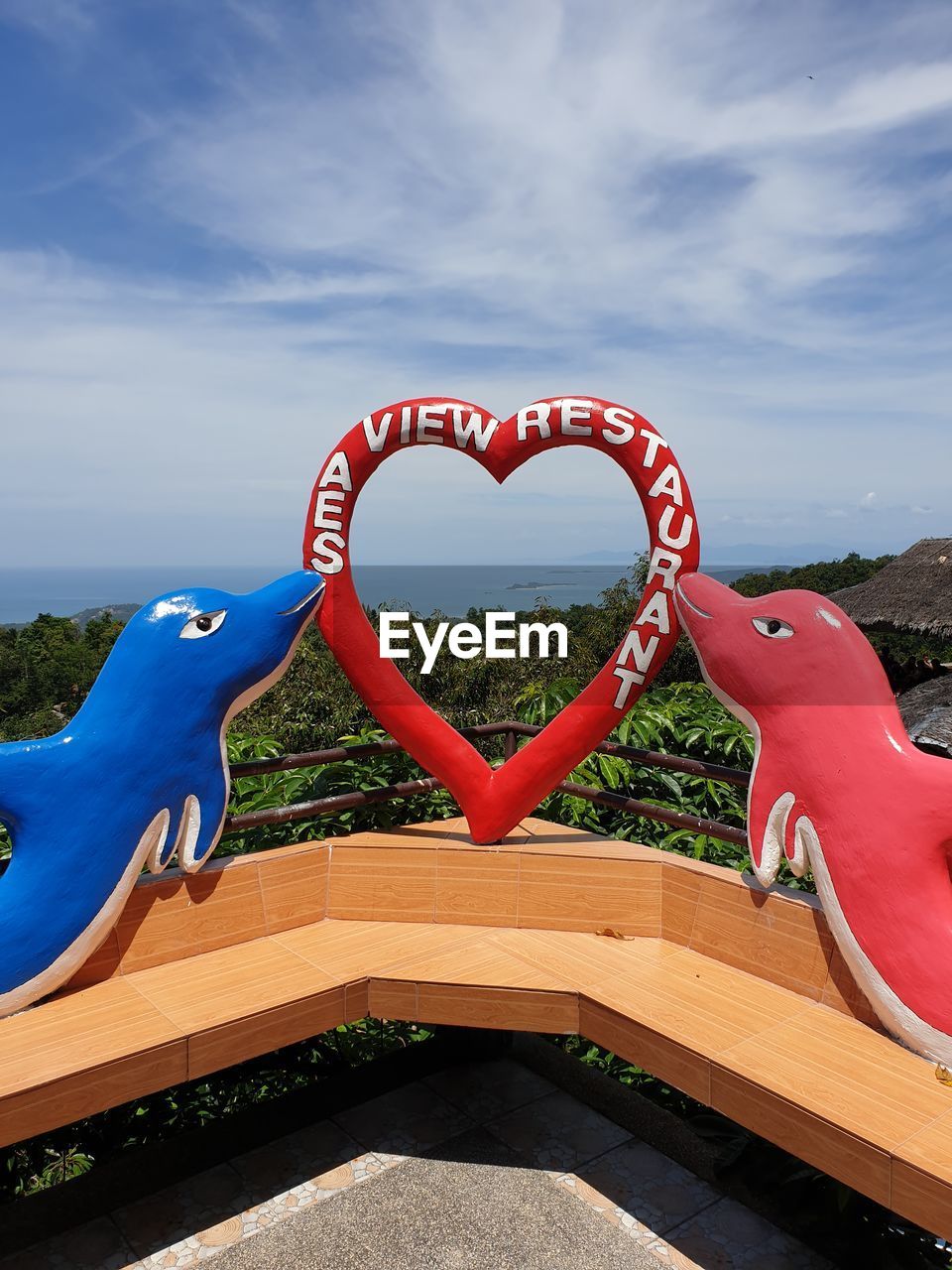 HEART SHAPE DECORATION AGAINST SKY SEEN FROM ROOF