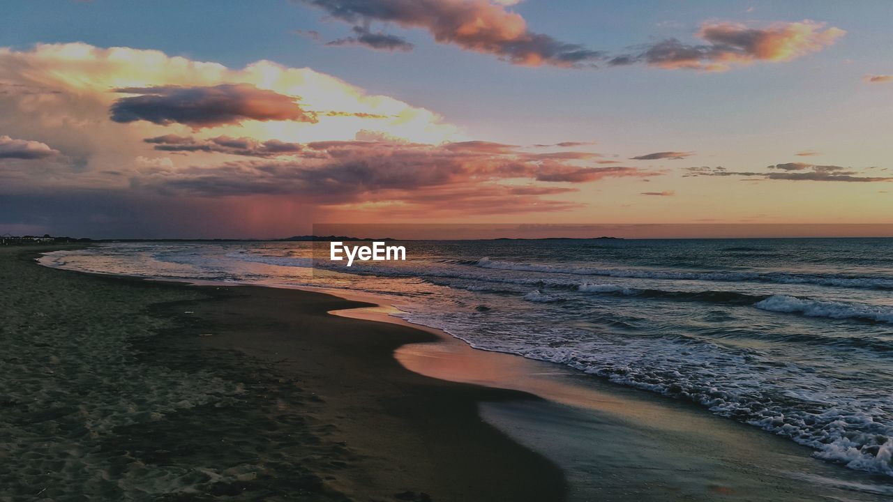 Scenic view of beach during sunset