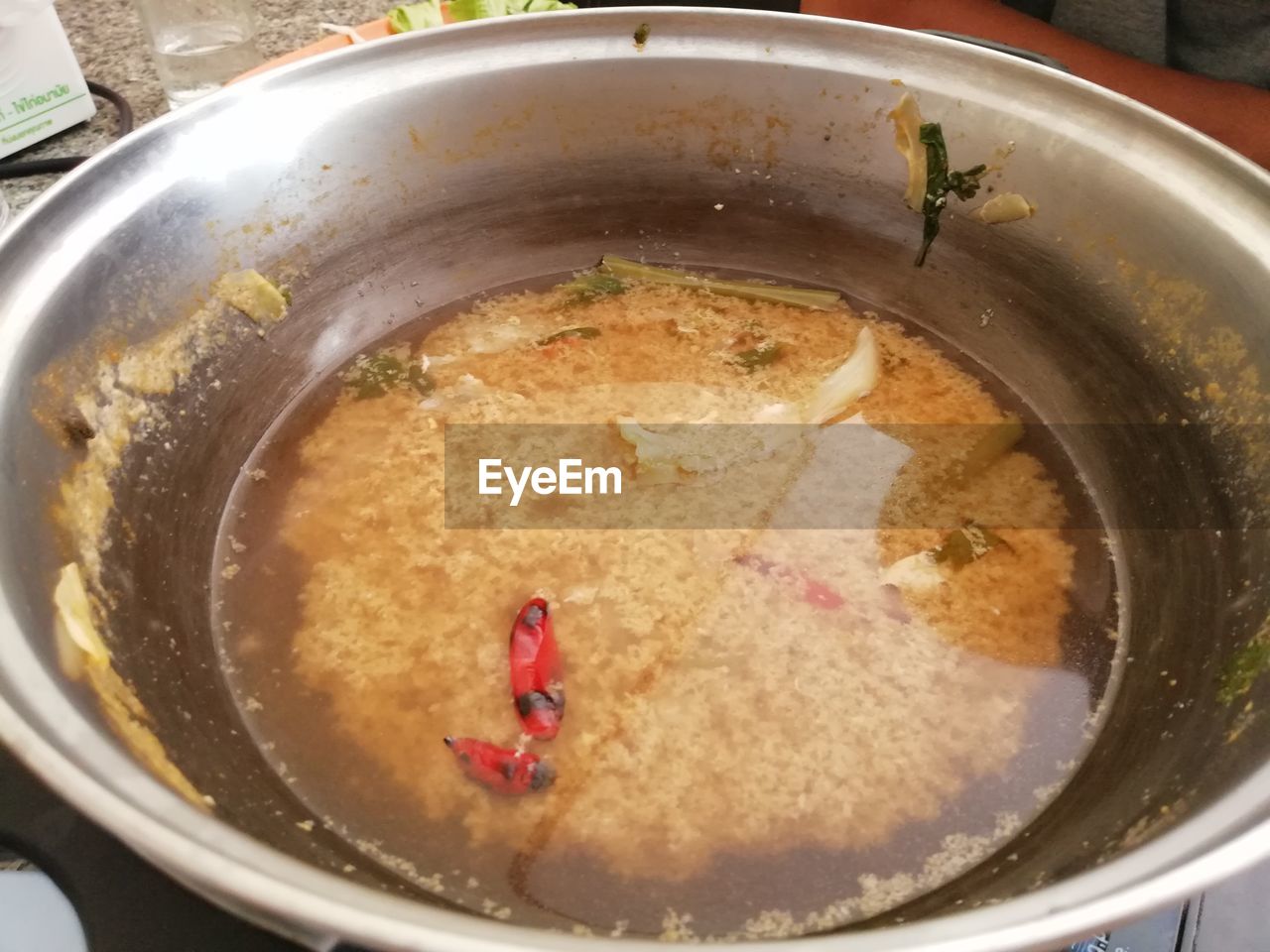 HIGH ANGLE VIEW OF SOUP IN CONTAINER