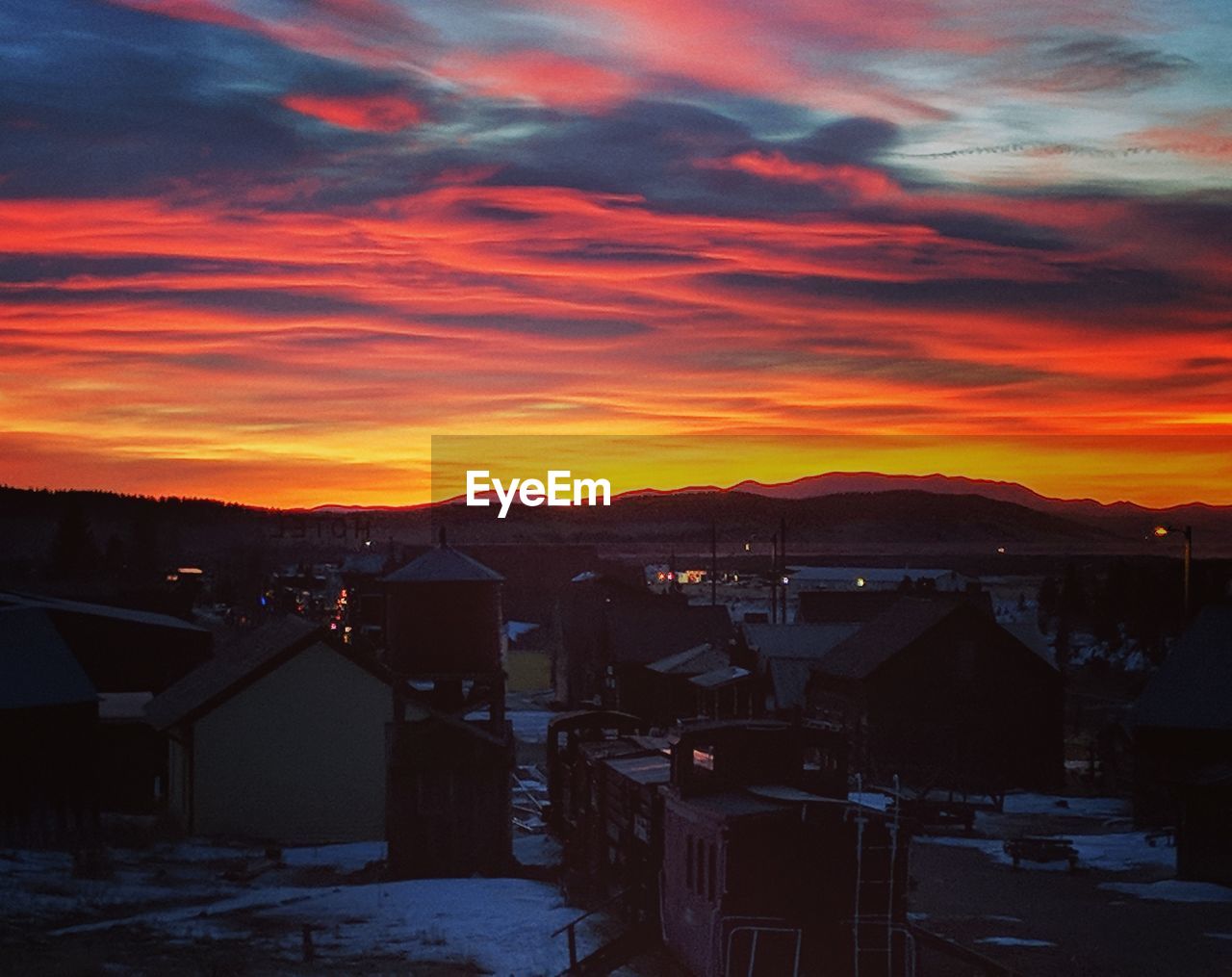 VIEW OF TOWN AT SUNSET