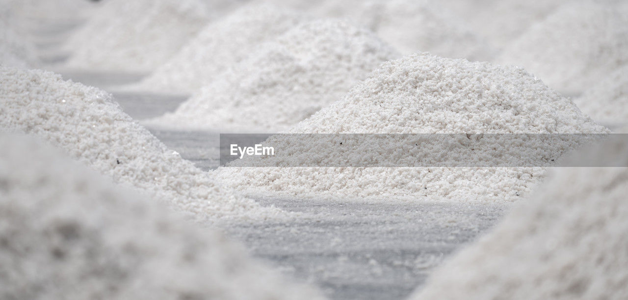 Sea salt farm. pile of brine salt. raw material of salt industrial. sodium chloride mineral.