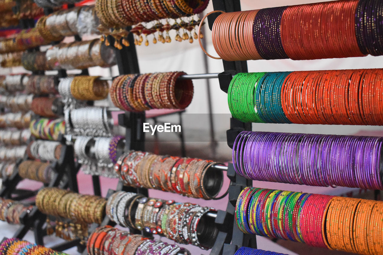 Multi colored bangles for sale in market