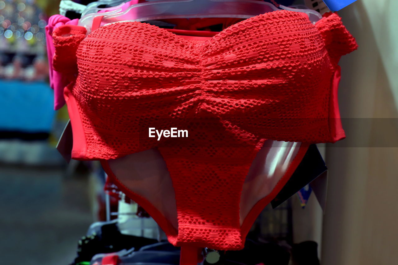 CLOSE-UP OF RED TOY IN HAT