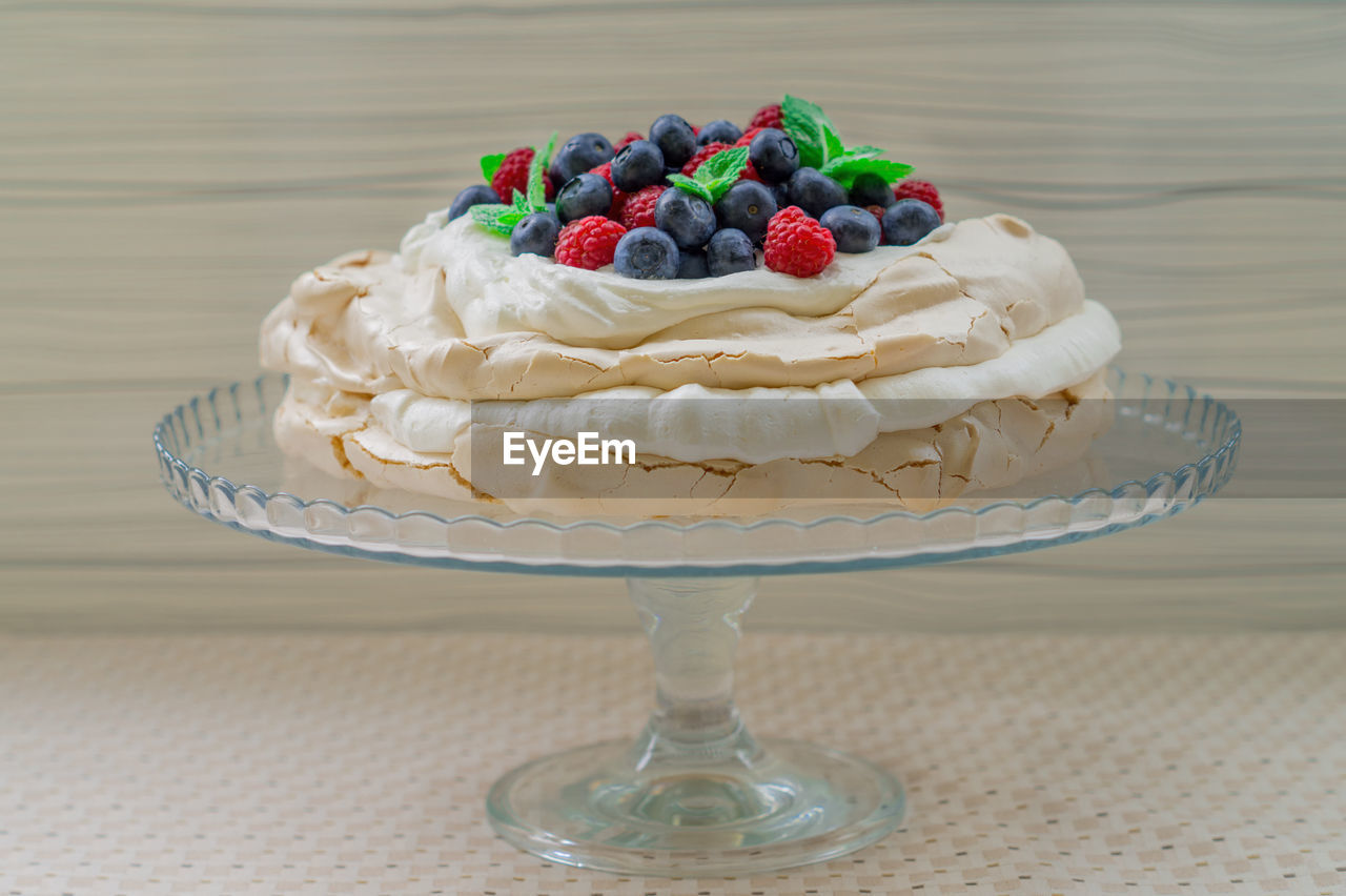 Close-up of pavlova cake on stand