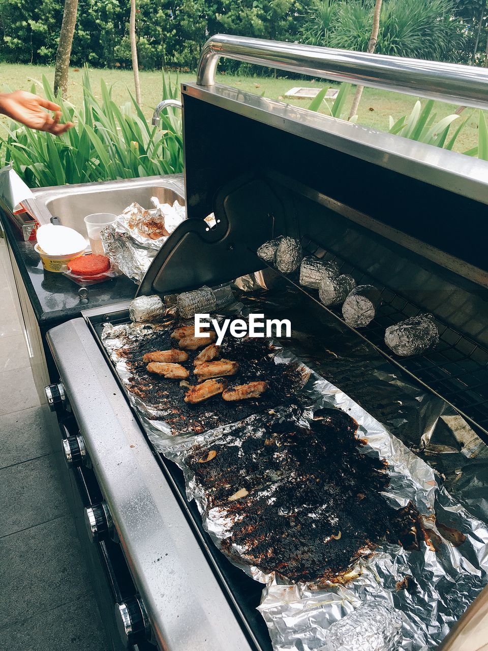 High angle view of food grilled on barbecue