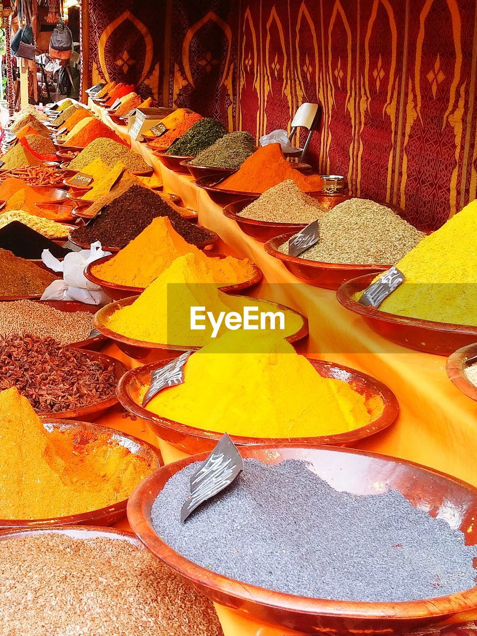 Various spices for sale at market stall