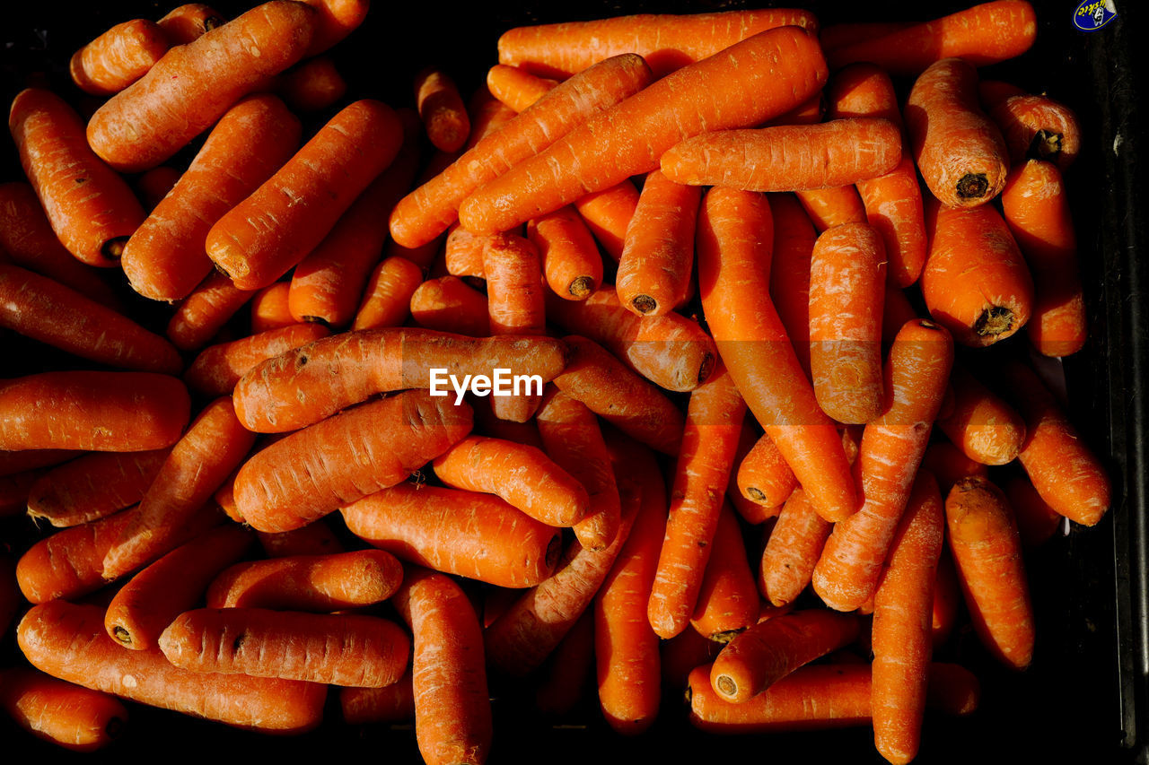 Full frame shot of carrots for sale at market