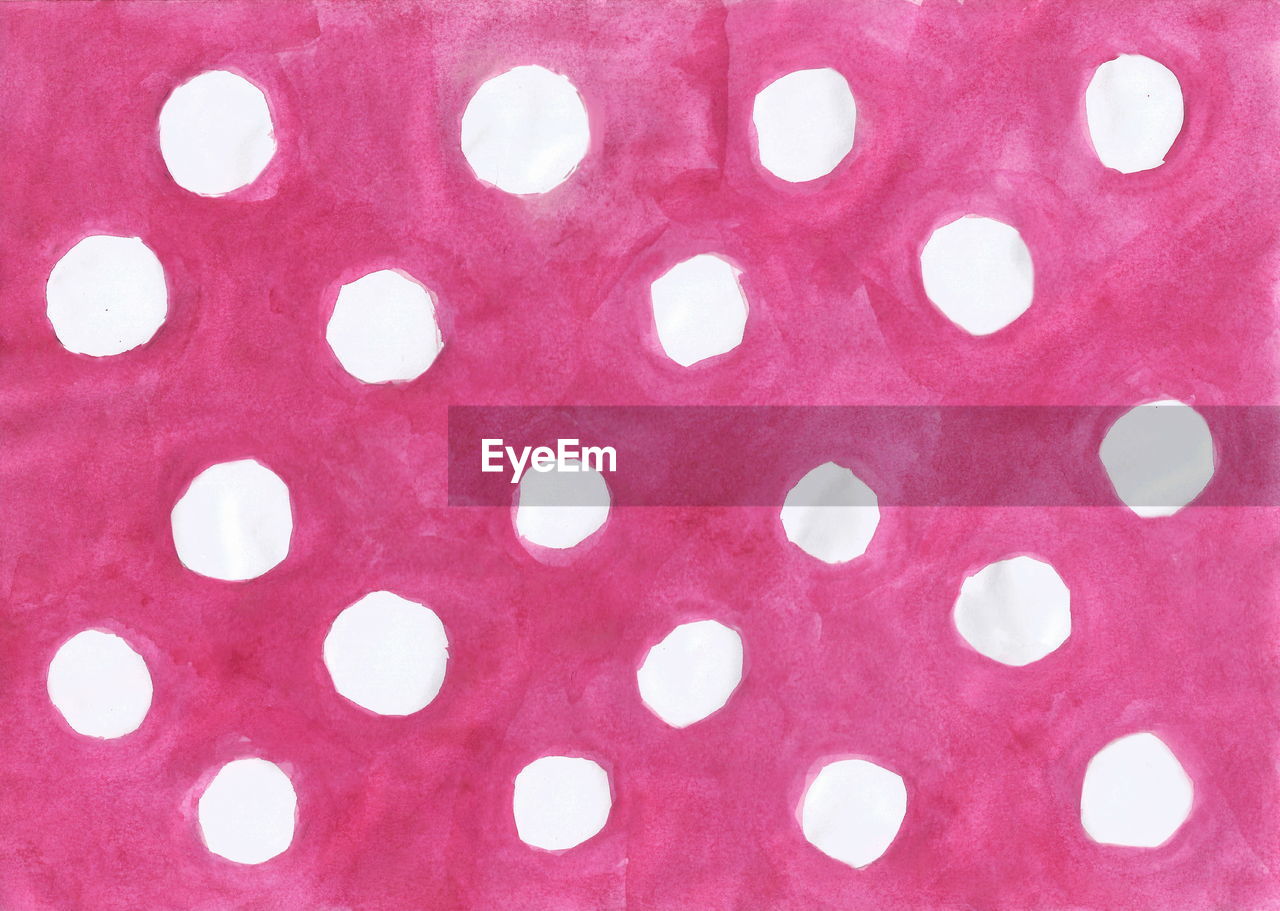 Closeup view on pink and white pattern watercolor painting