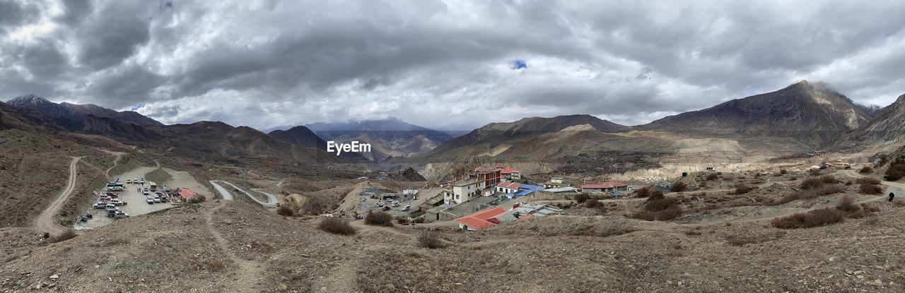 PANORAMIC VIEW OF LANDSCAPE AND MOUNTAINS