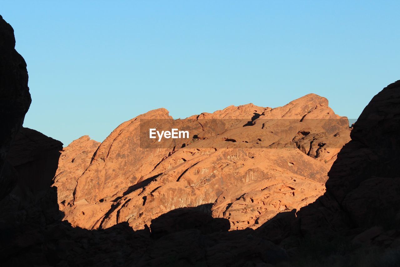 Rock formations against clear sky