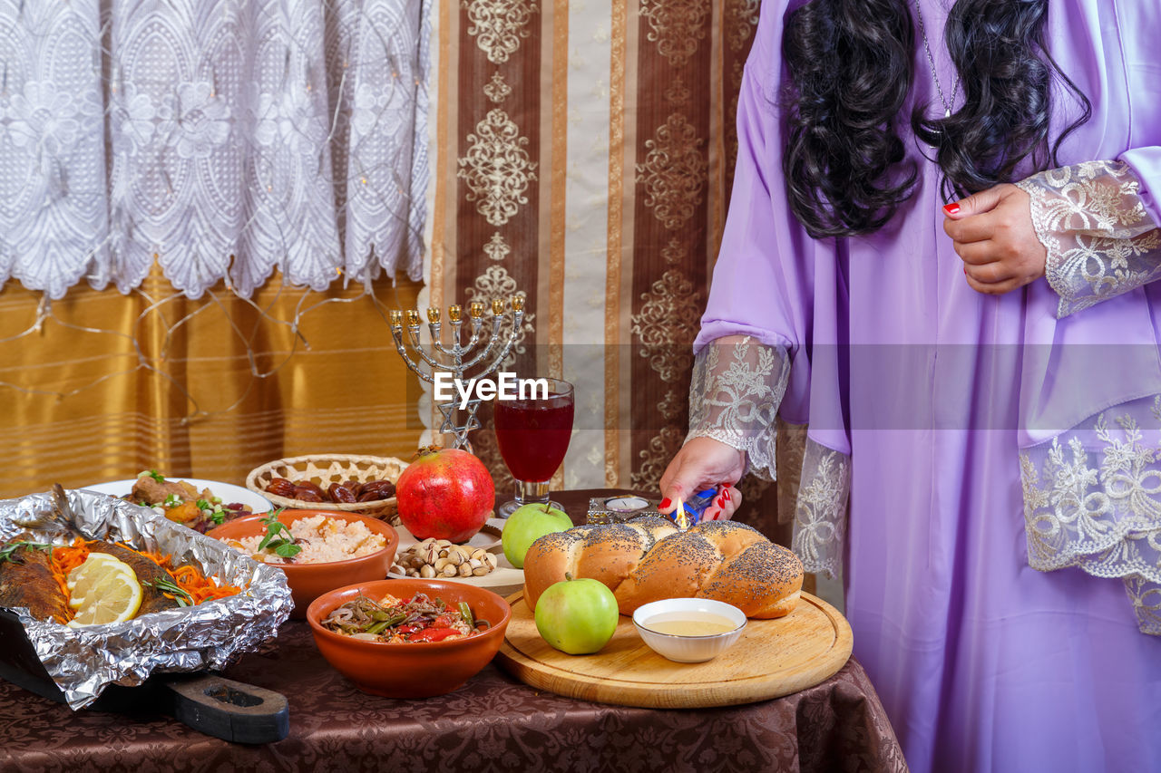 high angle view of woman with food in plate