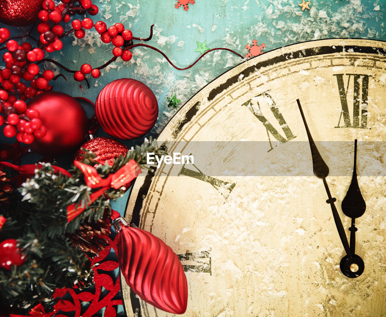 CLOSE-UP OF CLOCK ON PLANT