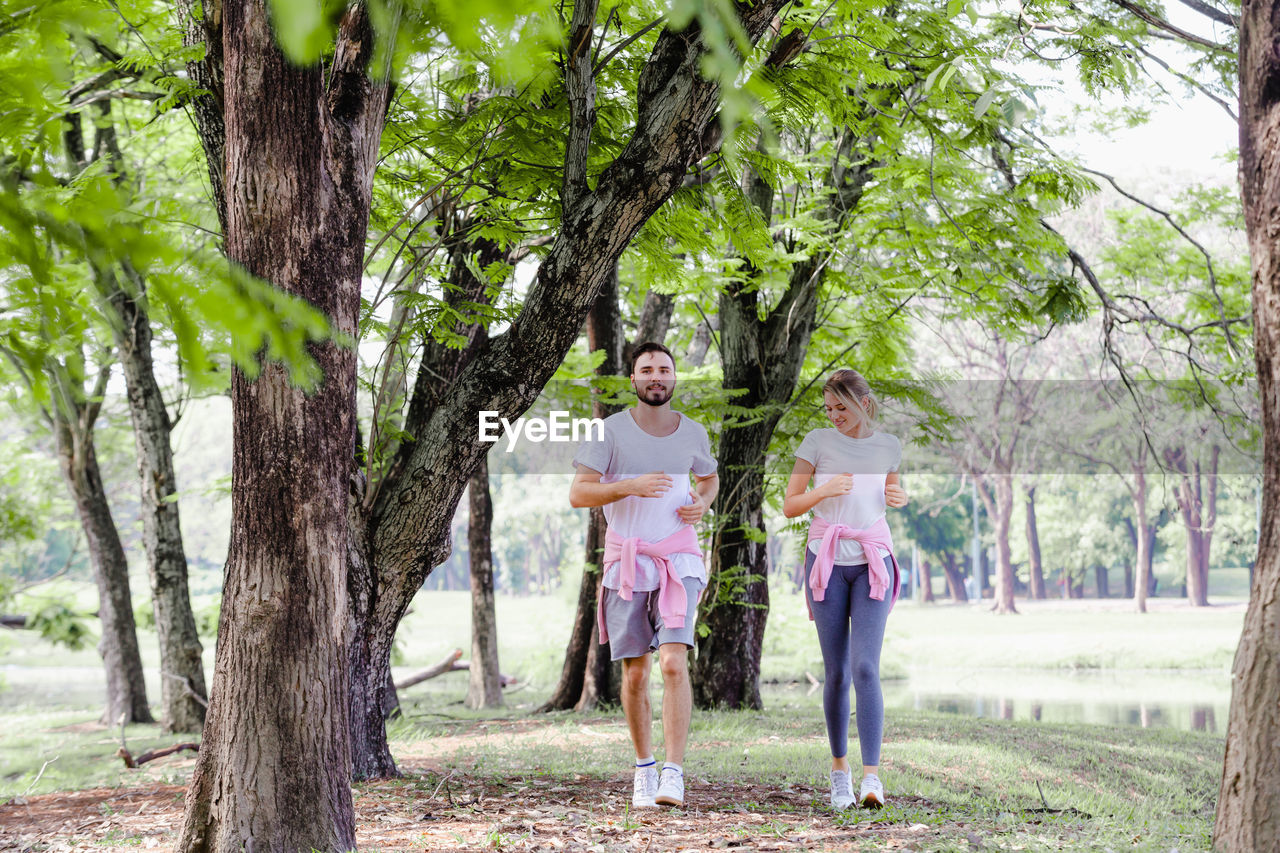 Young couple jogging at park