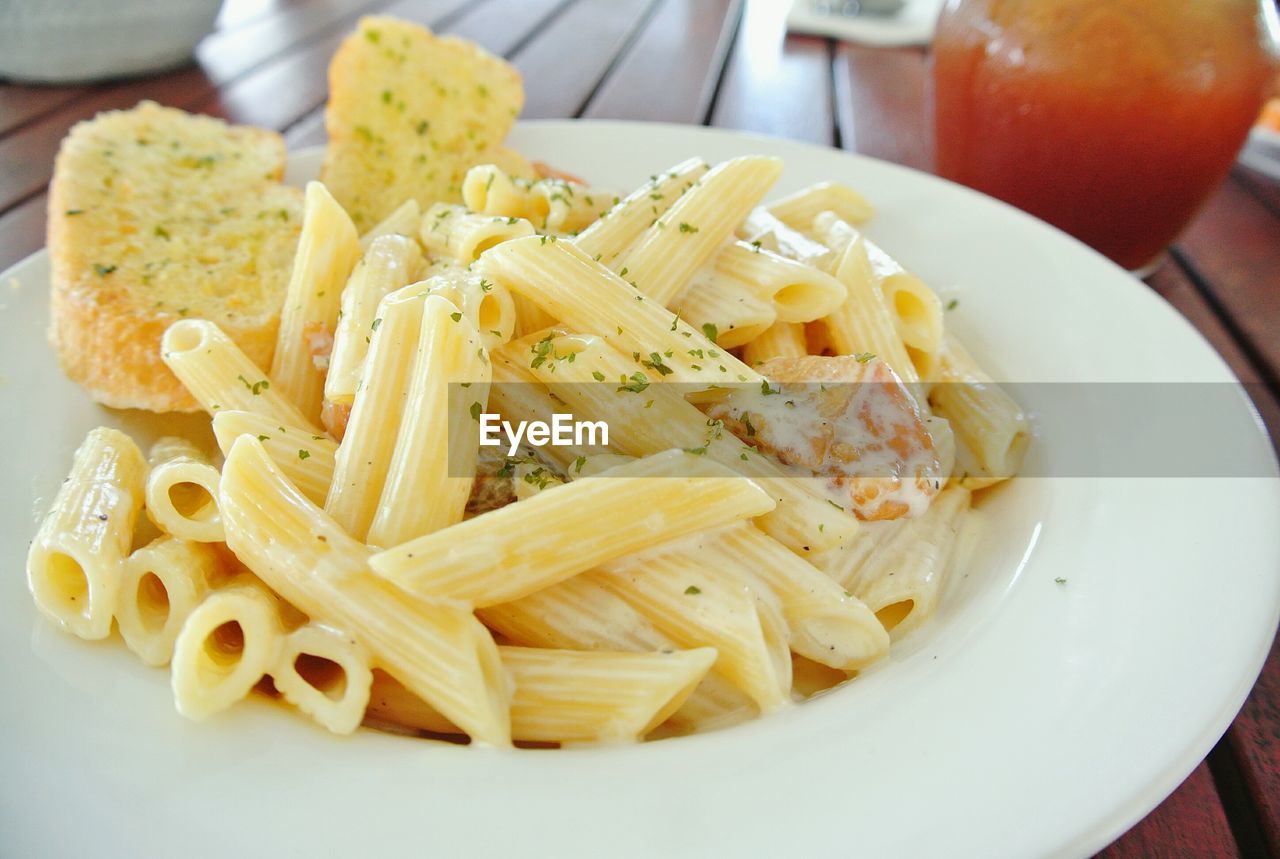 Close-up of pasta in plate on table