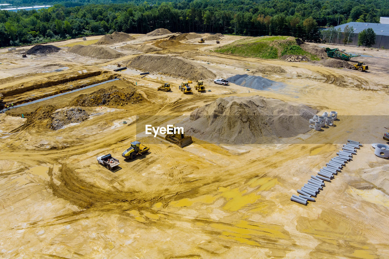 HIGH ANGLE VIEW OF CONSTRUCTION SITE IN LAND