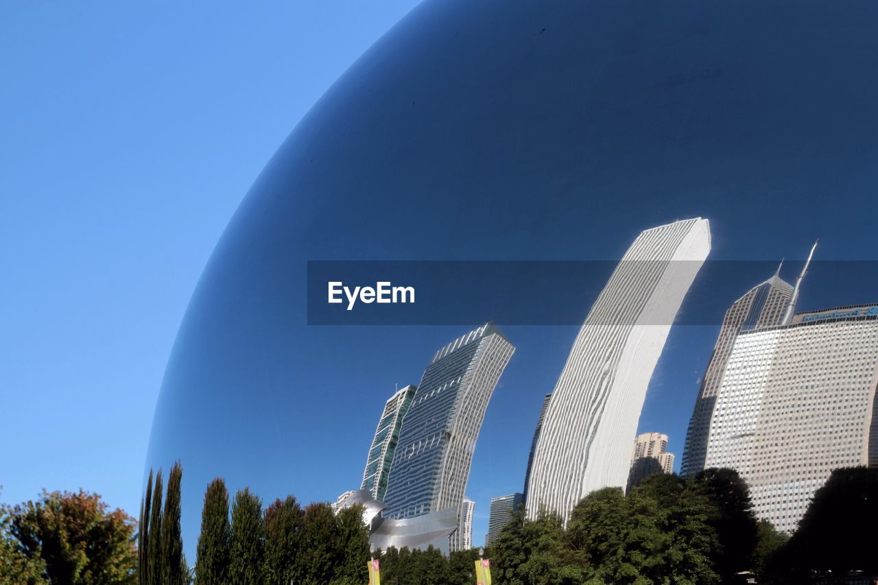 LOW ANGLE VIEW OF BUILDINGS AGAINST SKY