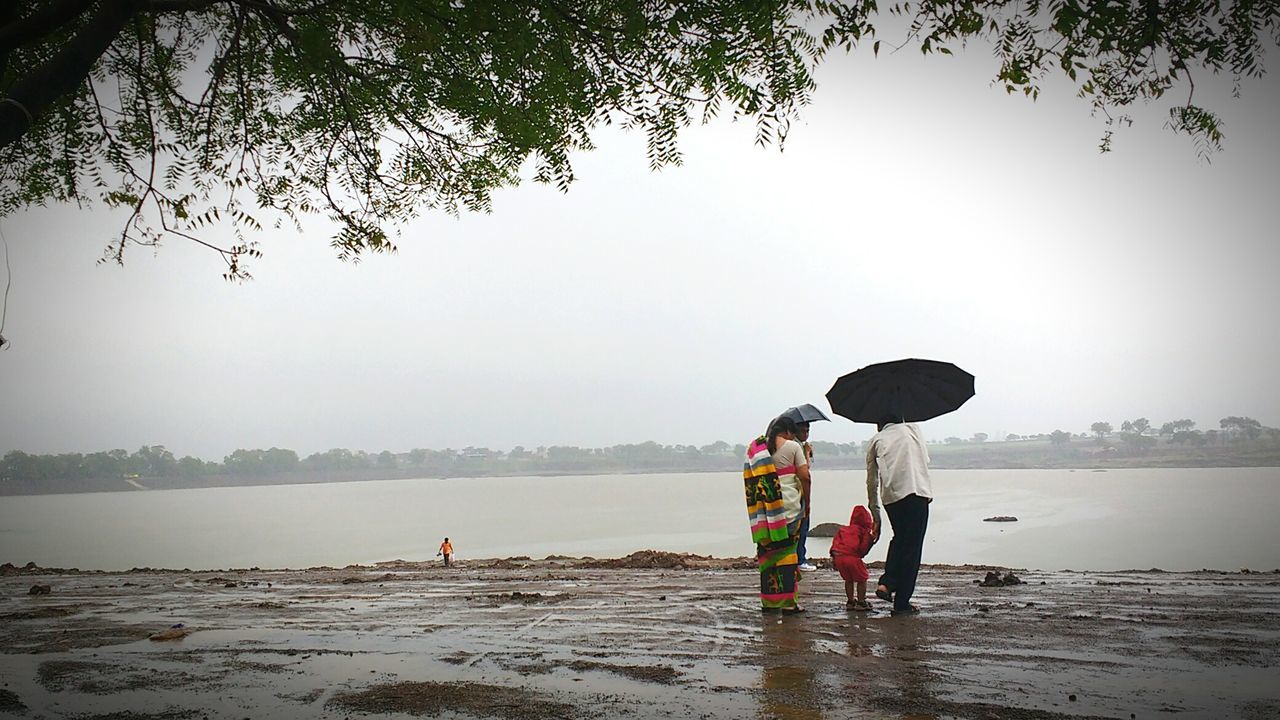 TOURISTS ON SHORE