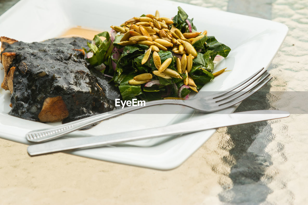 food and drink, food, dish, eating utensil, plate, healthy eating, fork, vegetable, wellbeing, produce, kitchen utensil, cuisine, freshness, meal, no people, italian food, table, dinner, indoors, pasta