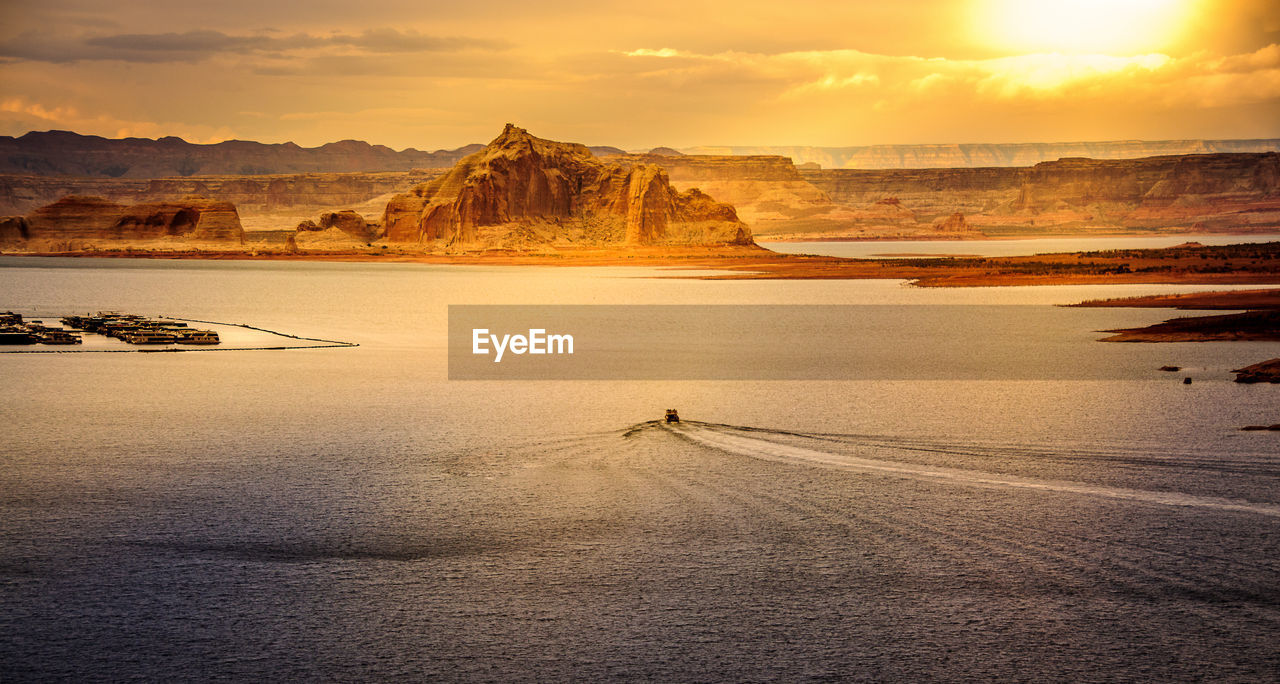 Scenic view of mountains against sky during sunset