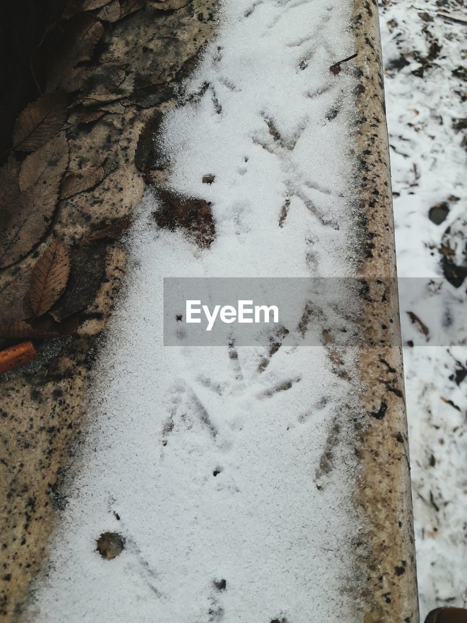 CLOSE-UP OF SNOW ON GROUND