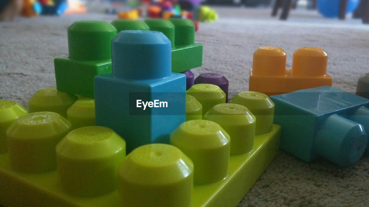 Close-up of multi colored toy blocks on floor
