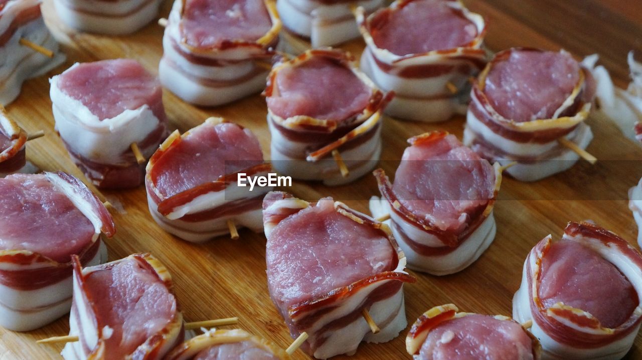 High angle view of raw pork fillet on table in kitchen