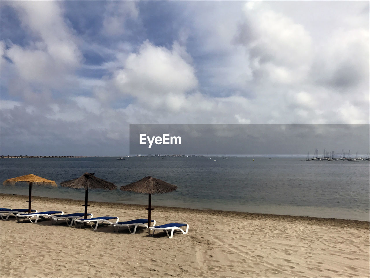 SCENIC VIEW OF BEACH AND SEA AGAINST SKY