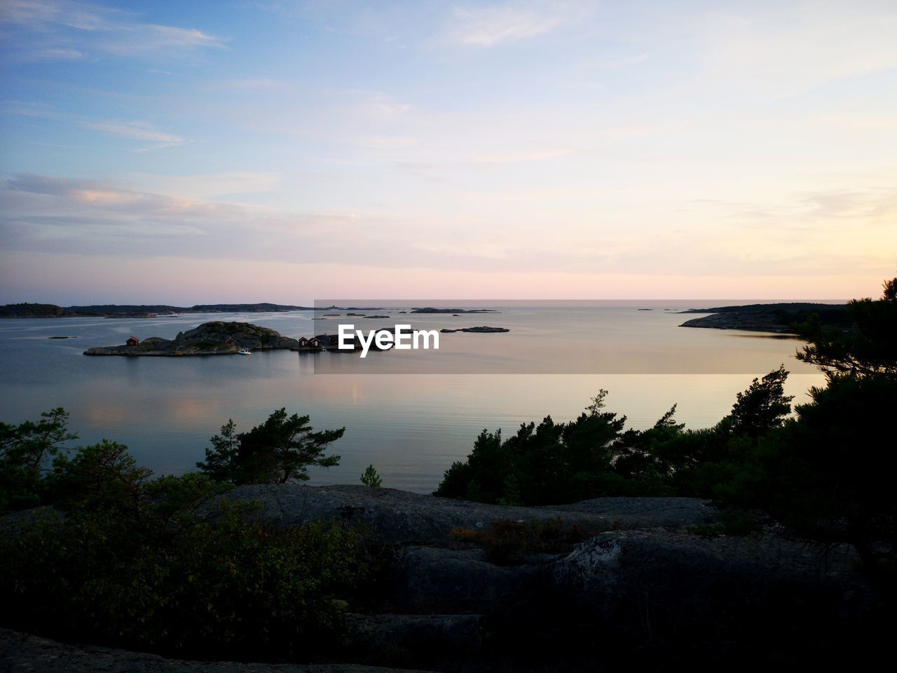 SCENIC VIEW OF SEA DURING SUNSET