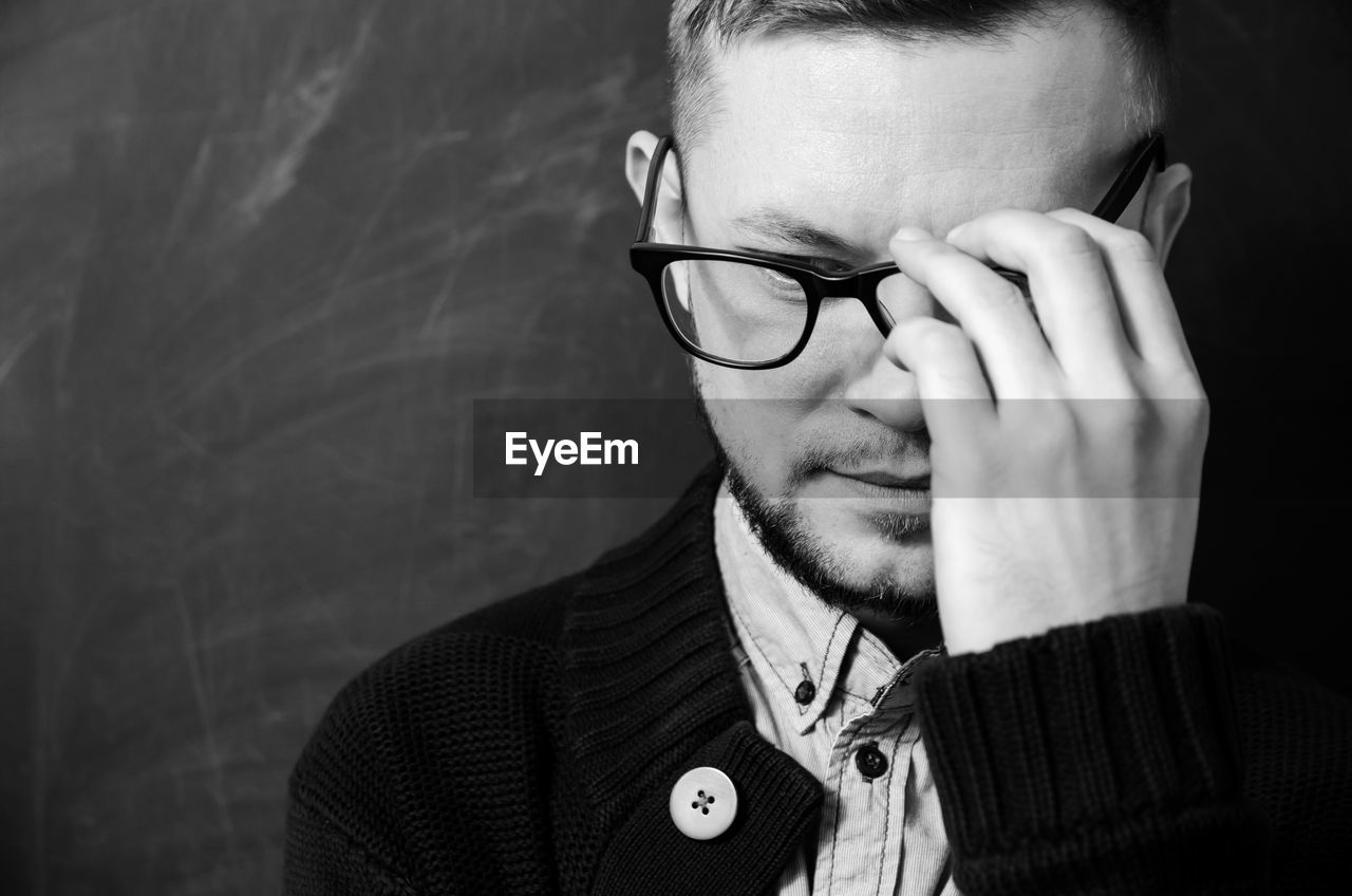 Close-up of man with eyeglasses