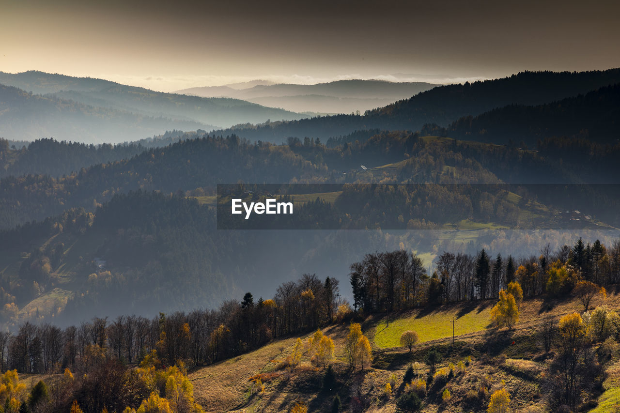 Scenic view of mountains against sky during autumn